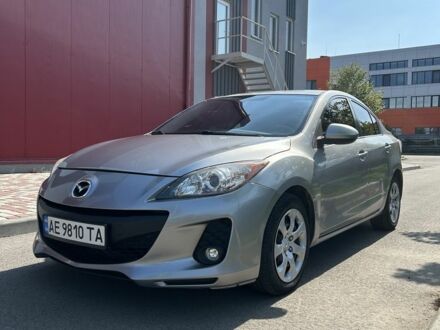 Серый Мазда 3, объемом двигателя 2 л и пробегом 129 тыс. км за 6802 $, фото 1 на Automoto.ua