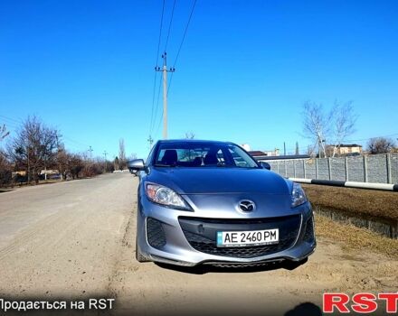 Серый Мазда 3, объемом двигателя 2 л и пробегом 166 тыс. км за 6500 $, фото 1 на Automoto.ua