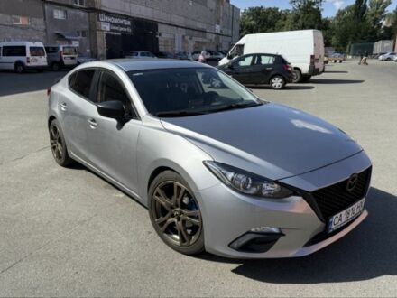 Серый Мазда 3, объемом двигателя 2 л и пробегом 234 тыс. км за 10489 $, фото 1 на Automoto.ua