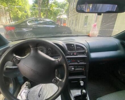 Синий Мазда 3, объемом двигателя 1.5 л и пробегом 250 тыс. км за 1350 $, фото 6 на Automoto.ua