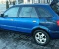 Синій Мазда 3, об'ємом двигуна 1.4 л та пробігом 3 тис. км за 1800 $, фото 1 на Automoto.ua