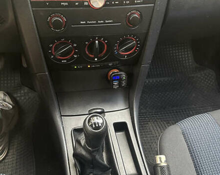 Синий Мазда 3, объемом двигателя 1.6 л и пробегом 243 тыс. км за 4000 $, фото 8 на Automoto.ua