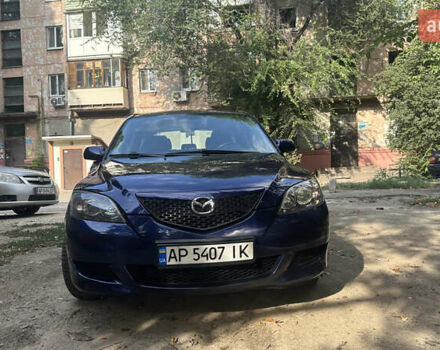Синий Мазда 3, объемом двигателя 1.6 л и пробегом 243 тыс. км за 4000 $, фото 1 на Automoto.ua