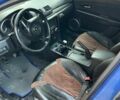 Синий Мазда 3, объемом двигателя 2 л и пробегом 350 тыс. км за 2296 $, фото 6 на Automoto.ua
