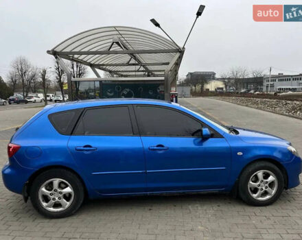 Синий Мазда 3, объемом двигателя 1.35 л и пробегом 182 тыс. км за 3400 $, фото 3 на Automoto.ua
