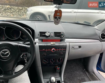 Синий Мазда 3, объемом двигателя 1.35 л и пробегом 182 тыс. км за 3400 $, фото 12 на Automoto.ua