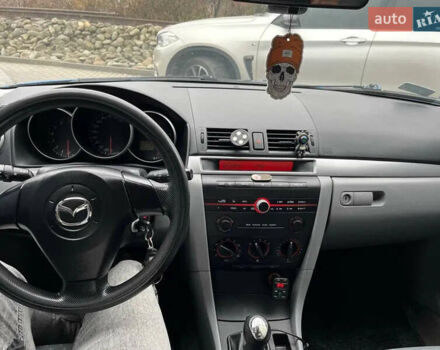 Синий Мазда 3, объемом двигателя 1.35 л и пробегом 182 тыс. км за 3400 $, фото 14 на Automoto.ua