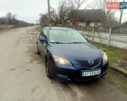 Синій Мазда 3, об'ємом двигуна 1.35 л та пробігом 260 тис. км за 2500 $, фото 1 на Automoto.ua