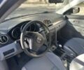 Синий Мазда 3, объемом двигателя 1.3 л и пробегом 256 тыс. км за 4000 $, фото 4 на Automoto.ua