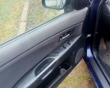 Синій Мазда 3, об'ємом двигуна 1.35 л та пробігом 260 тис. км за 2500 $, фото 5 на Automoto.ua