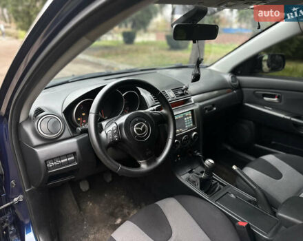 Синий Мазда 3, объемом двигателя 1.6 л и пробегом 238 тыс. км за 3700 $, фото 25 на Automoto.ua