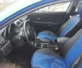 Синий Мазда 3, объемом двигателя 1.6 л и пробегом 234 тыс. км за 2000 $, фото 5 на Automoto.ua