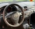 Синій Мазда 3, об'ємом двигуна 1.6 л та пробігом 350 тис. км за 2550 $, фото 4 на Automoto.ua