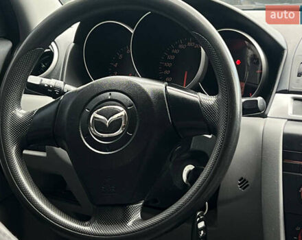 Синий Мазда 3, объемом двигателя 1.35 л и пробегом 182 тыс. км за 3900 $, фото 15 на Automoto.ua