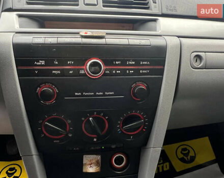 Синий Мазда 3, объемом двигателя 1.35 л и пробегом 182 тыс. км за 3900 $, фото 11 на Automoto.ua