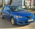 Синий Мазда 3, объемом двигателя 1.4 л и пробегом 256 тыс. км за 4000 $, фото 1 на Automoto.ua