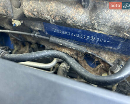 Синий Мазда 3, объемом двигателя 1.35 л и пробегом 170 тыс. км за 3900 $, фото 9 на Automoto.ua