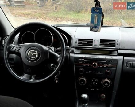 Синий Мазда 3, объемом двигателя 1.6 л и пробегом 287 тыс. км за 2100 $, фото 2 на Automoto.ua