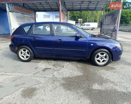 Синій Мазда 3, об'ємом двигуна 1.35 л та пробігом 260 тис. км за 3200 $, фото 4 на Automoto.ua