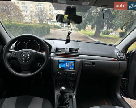 Синий Мазда 3, объемом двигателя 1.6 л и пробегом 237 тыс. км за 3950 $, фото 29 на Automoto.ua