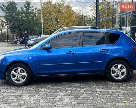 Синий Мазда 3, объемом двигателя 1.35 л и пробегом 182 тыс. км за 3900 $, фото 3 на Automoto.ua