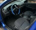 Синий Мазда 3, объемом двигателя 1.6 л и пробегом 240 тыс. км за 3908 $, фото 5 на Automoto.ua