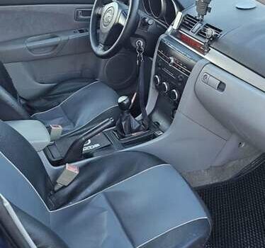 Синий Мазда 3, объемом двигателя 1.56 л и пробегом 360 тыс. км за 4200 $, фото 4 на Automoto.ua