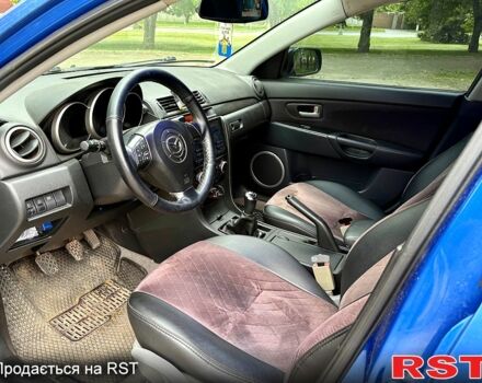 Синій Мазда 3, об'ємом двигуна 1.3 л та пробігом 243 тис. км за 3300 $, фото 4 на Automoto.ua