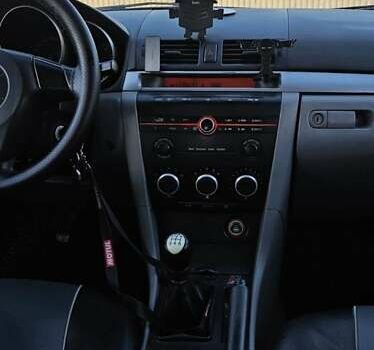 Синий Мазда 3, объемом двигателя 1.56 л и пробегом 360 тыс. км за 4200 $, фото 3 на Automoto.ua