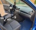 Синий Мазда 3, объемом двигателя 1.6 л и пробегом 268 тыс. км за 4550 $, фото 6 на Automoto.ua