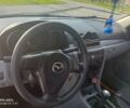 Синий Мазда 3, объемом двигателя 1.3 л и пробегом 220 тыс. км за 3700 $, фото 1 на Automoto.ua