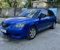 Синій Мазда 3, об'ємом двигуна 1.3 л та пробігом 214 тис. км за 4004 $, фото 3 на Automoto.ua