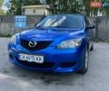 Синий Мазда 3, объемом двигателя 1.4 л и пробегом 214 тыс. км за 3800 $, фото 1 на Automoto.ua