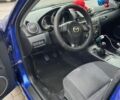 Синій Мазда 3, об'ємом двигуна 1.6 л та пробігом 230 тис. км за 3650 $, фото 5 на Automoto.ua