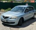 Синий Мазда 3, объемом двигателя 1.35 л и пробегом 162 тыс. км за 3900 $, фото 1 на Automoto.ua