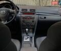 Синий Мазда 3, объемом двигателя 1.6 л и пробегом 159 тыс. км за 5700 $, фото 4 на Automoto.ua