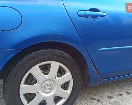 Синій Мазда 3, об'ємом двигуна 1.56 л та пробігом 358 тис. км за 3300 $, фото 10 на Automoto.ua
