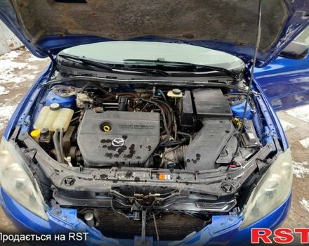 Синий Мазда 3, объемом двигателя 2 л и пробегом 230 тыс. км за 4500 $, фото 2 на Automoto.ua