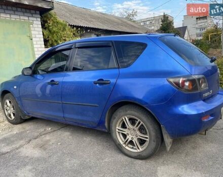 Синий Мазда 3, объемом двигателя 1.6 л и пробегом 180 тыс. км за 4000 $, фото 1 на Automoto.ua