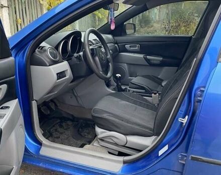Синий Мазда 3, объемом двигателя 1.6 л и пробегом 180 тыс. км за 4000 $, фото 3 на Automoto.ua