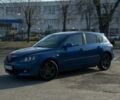 Синий Мазда 3, объемом двигателя 1.6 л и пробегом 233 тыс. км за 2950 $, фото 1 на Automoto.ua