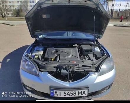 Синий Мазда 3, объемом двигателя 1.6 л и пробегом 172 тыс. км за 5800 $, фото 6 на Automoto.ua