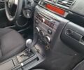 Синій Мазда 3, об'ємом двигуна 1.6 л та пробігом 230 тис. км за 5800 $, фото 12 на Automoto.ua