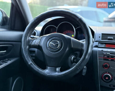 Синий Мазда 3, объемом двигателя 1.6 л и пробегом 206 тыс. км за 5900 $, фото 48 на Automoto.ua