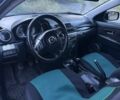 Синий Мазда 3, объемом двигателя 1.6 л и пробегом 324 тыс. км за 3000 $, фото 2 на Automoto.ua