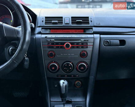 Синий Мазда 3, объемом двигателя 1.6 л и пробегом 206 тыс. км за 5900 $, фото 47 на Automoto.ua