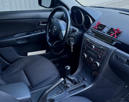 Синий Мазда 3, объемом двигателя 1.6 л и пробегом 205 тыс. км за 5999 $, фото 19 на Automoto.ua