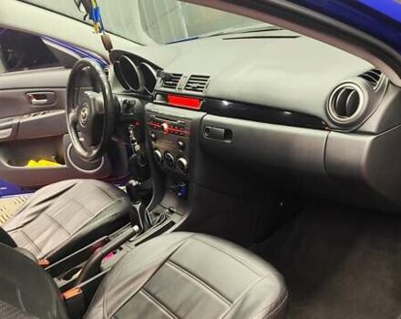 Синій Мазда 3, об'ємом двигуна 1.35 л та пробігом 220 тис. км за 4500 $, фото 13 на Automoto.ua