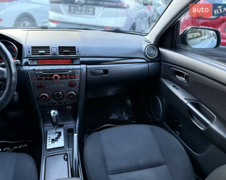 Синий Мазда 3, объемом двигателя 1.6 л и пробегом 206 тыс. км за 5900 $, фото 46 на Automoto.ua