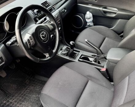 Синий Мазда 3, объемом двигателя 1.6 л и пробегом 205 тыс. км за 4900 $, фото 8 на Automoto.ua